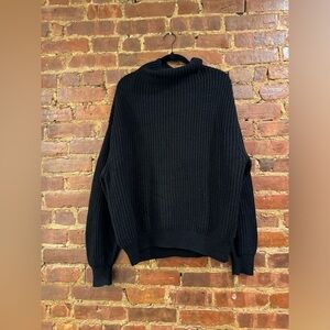 Black knitted oversized turtle neck sweater